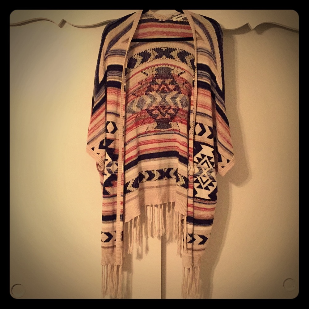 Boho style sweater with fringe bottom